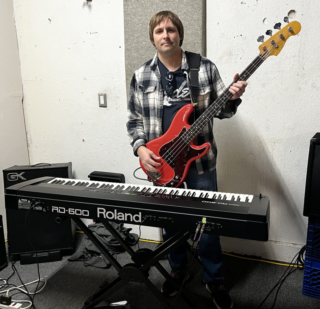 Bass and Keys Player Adam